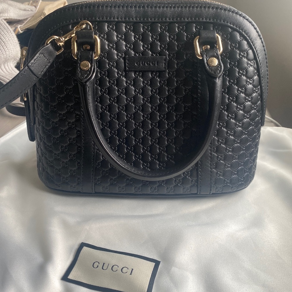 Gucci MicroGuccissima black dome crossbody bag